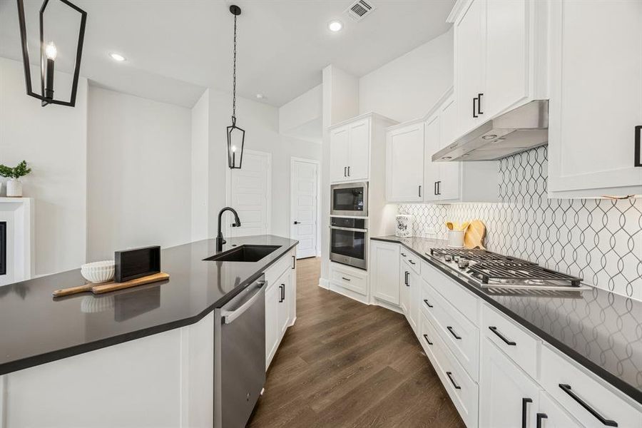 Furnished interior view inside a new home in Elements at Viridian - Garden Series, Arlington (Image 4). Furnished interior view inside a new home in Elements at Viridian - Garden Series, Arlington (Image 4).