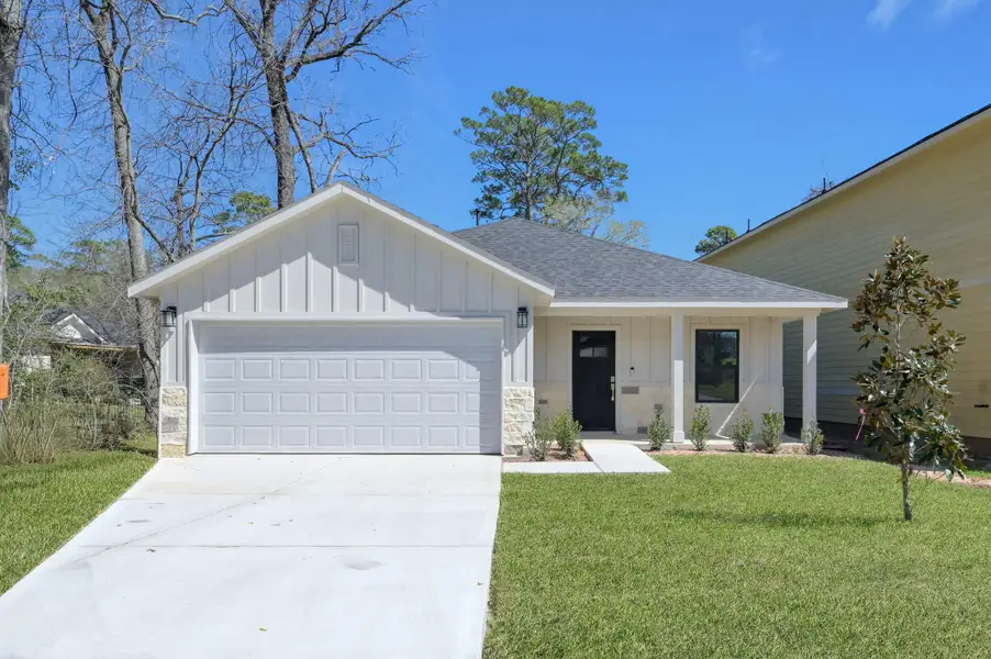 Welcome home! This charming ranch-style residence offers a crisp, clean aesthetic with a spacious two-car garage and manicured lawn.