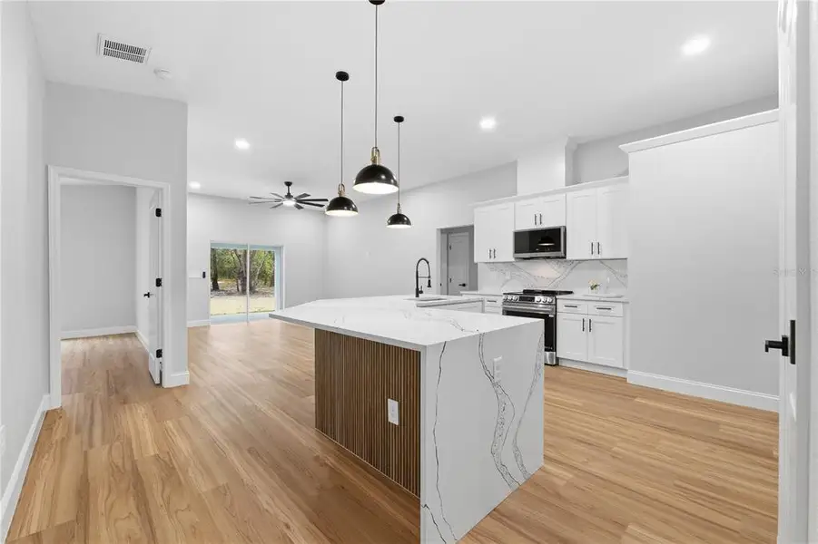Furnished interior view inside a new home in , Webster (Image 11).