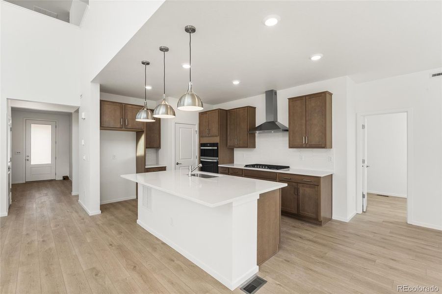Furnished interior view inside a new home in Harvest Crossing, Aurora (Image 9).