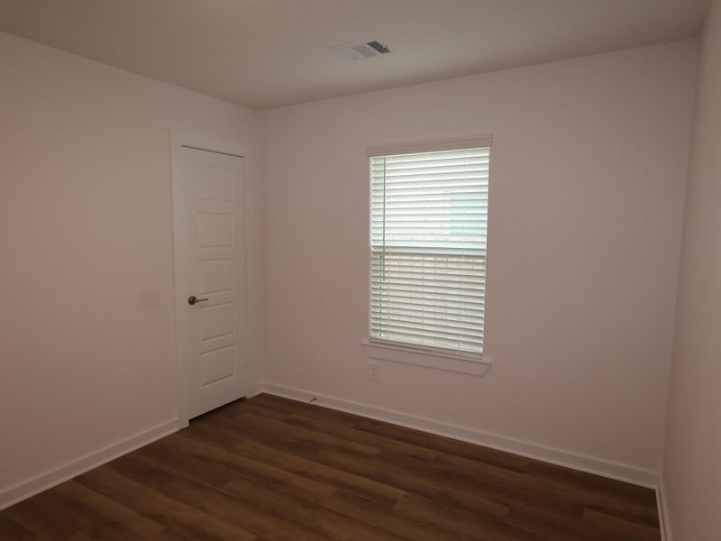 Spacious, unfurnished interior of a new home in Sorella, Tomball (Image 36).