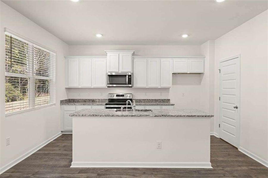 Furnished interior view inside a new home in Oakchase at Hampton, Hampton (Image 40).