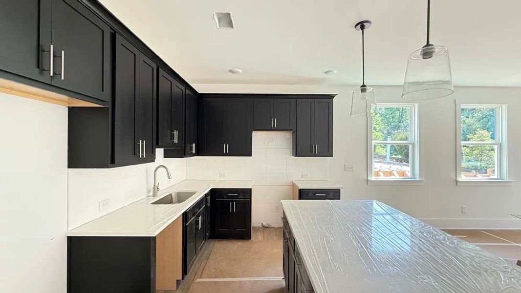Kitchen featuring Industrial Collection Finishes Construction Progress