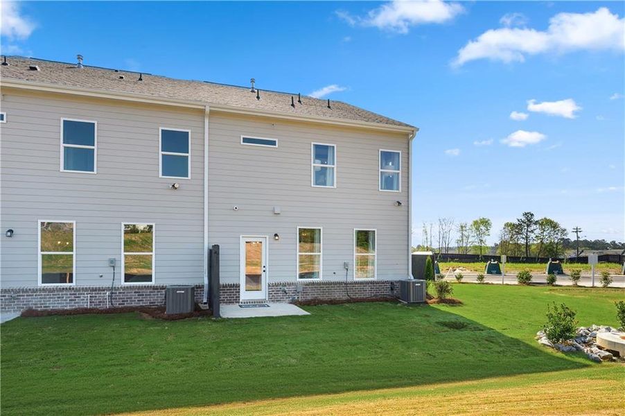 Exterior details and patio area of a home in Avery Landing, McDonough (Image 4).