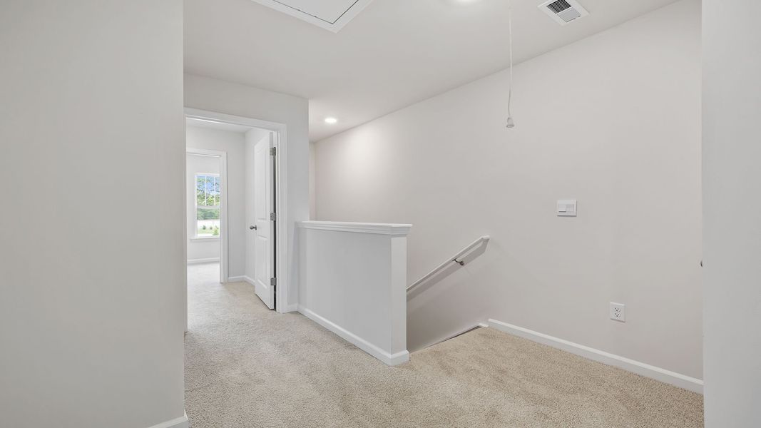 Spacious, unfurnished interior of a new home in Tanglewood Townes, Greenville (Image 18).