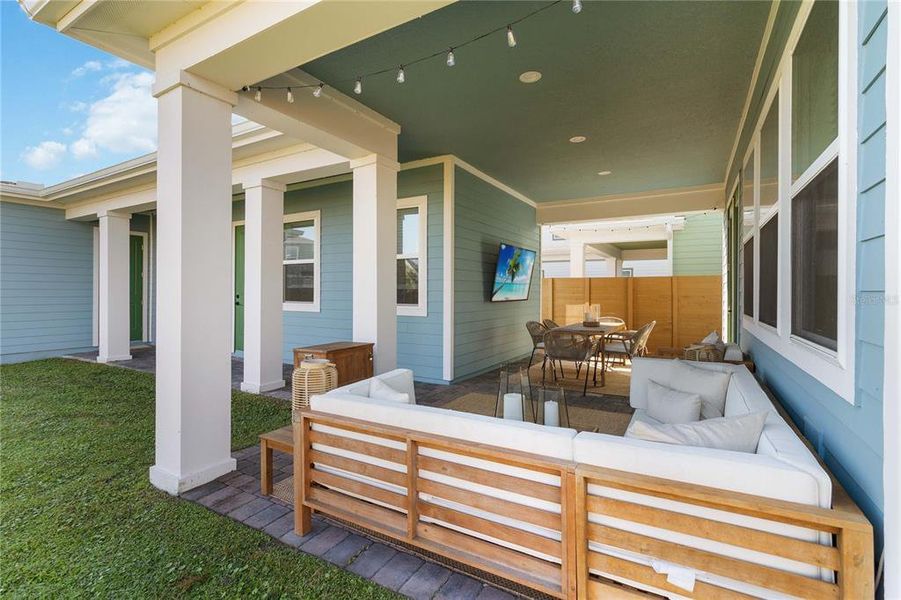 Exterior details and patio area of a home in Weslyn Park at Sunbridge (Craft Homes), St. Cloud (Image 30).
