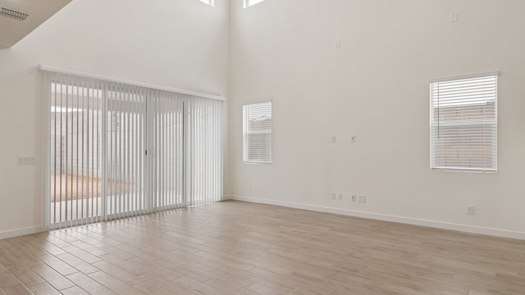 Representative unfurnished interior of a home built from the Phoenician by D.R. Horton in The Ridge at Stone Butte, Phoenix (Image 19).
