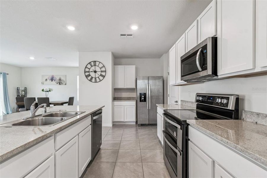 Furnished interior view inside a new home in Westgate at Avalon Park, Wesley Chapel (Image 7).