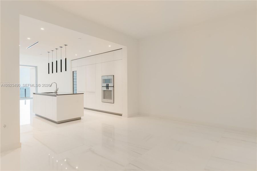 Spacious, unfurnished interior of a new home in Aston Martin Residences, Miami (Image 23).