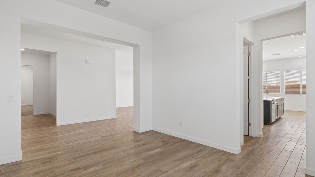 Spacious, unfurnished interior of a new home in The Ridge at Stone Butte, Phoenix (Image 27).