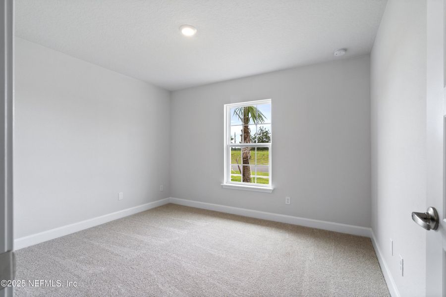 Spacious, unfurnished interior of a new home in Shadow Crest at Rolling Hills, Green Cove Springs (Image 13).
