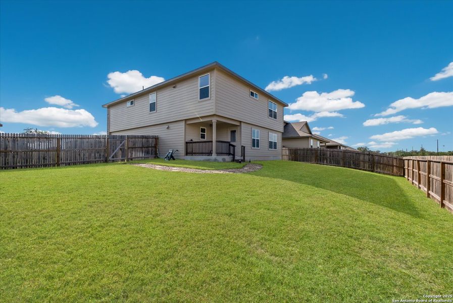 Front exterior of a new home in Red River Ranch, Cibolo, TX, highlighting curb appeal (Image 19). Front exterior of a new home in Red River Ranch, Cibolo, TX, highlighting curb appeal (Image 19).