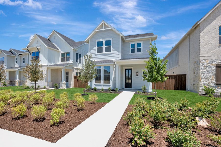 Front exterior of a new home in Walsh Cottage, Fort Worth, TX, highlighting curb appeal (Image 2). Front exterior of a new home in Walsh Cottage, Fort Worth, TX, highlighting curb appeal (Image 2).