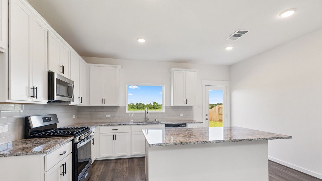 Furnished interior view inside a new home in Mostyn Springs, Magnolia (Image 12).