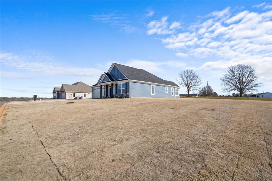 Representative exterior photo of a completed home built from the Roosevelt by Enchanted Homes in Messer Farms, Inman, SC (Image 23). Representative exterior photo of a completed home built from the Roosevelt by Enchanted Homes in Messer Farms, Inman, SC (Image 23).