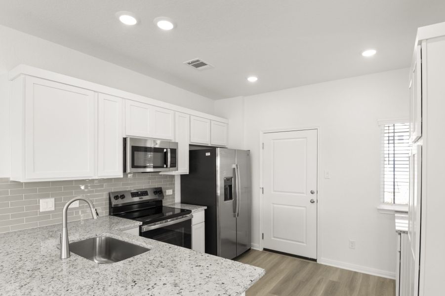 Furnished interior view inside a new home in Cool Water at Sonterra, Jarrell (Image 7).