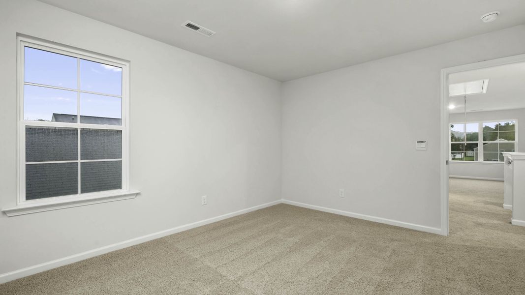 Representative unfurnished interior of a home built from the Manning by D.R. Horton in Chandler Pointe, Rural Hall (Image 21).