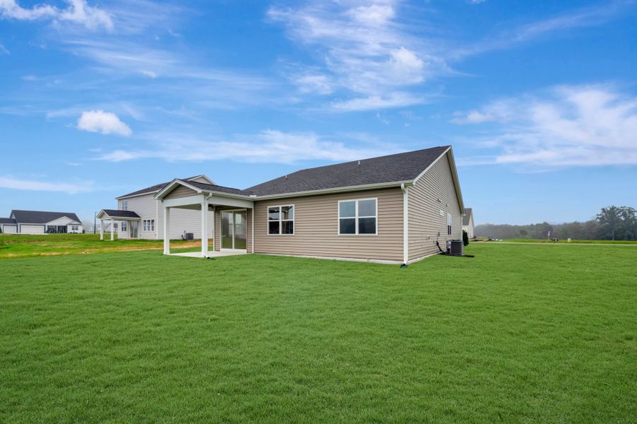 Exterior details and patio area of a home in Fox Field Farms, Broadway (Image 4).