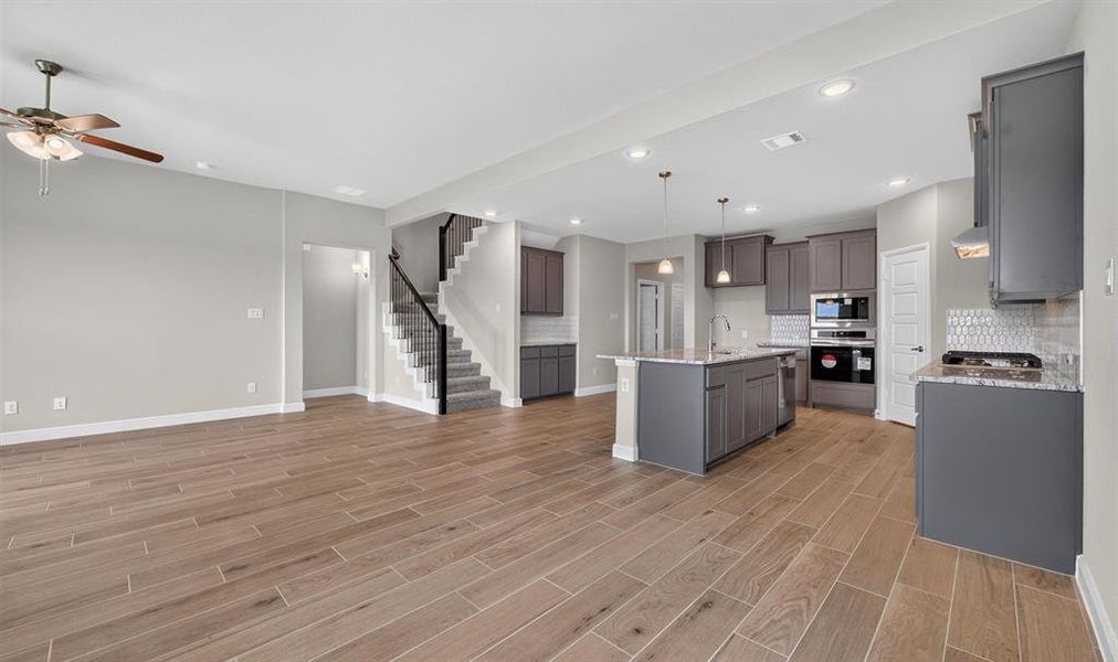 Furnished interior view inside a new home in Treeline, Justin (Image 6).