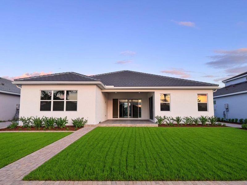 Exterior details and patio area of a home in Westlake, Loxahatchee (Image 30).