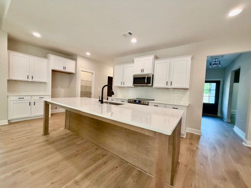 Furnished interior view inside a new home in Deer Creek, Moreland (Image 3).