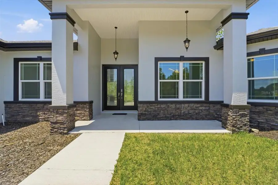 Exterior details and patio area of a home in , Beverly Hills (Image 3).