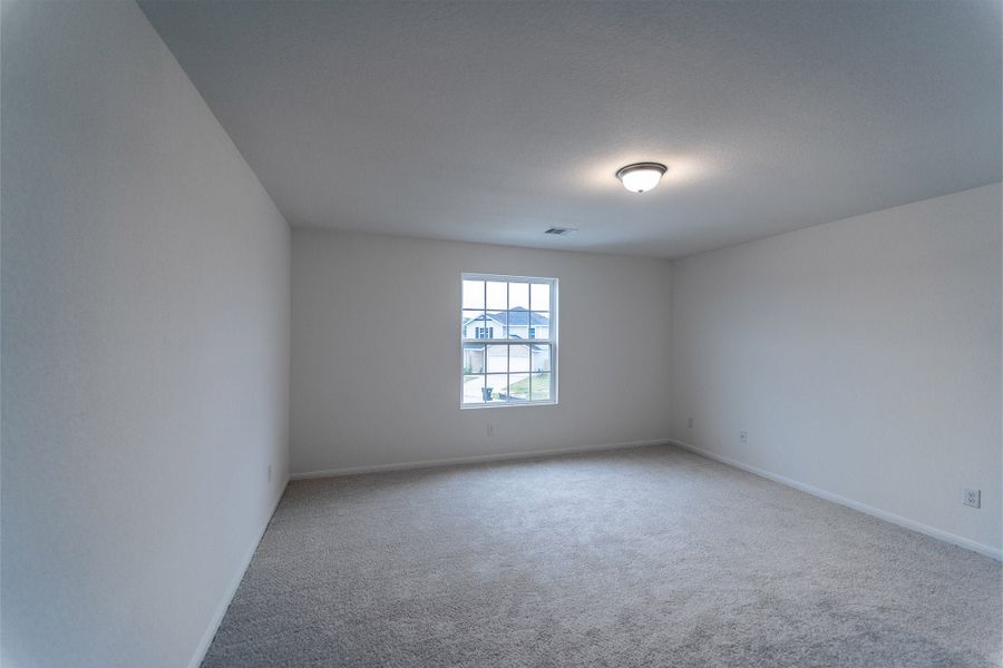 Spacious, unfurnished interior of a new home in Sweetgrass Village, Crosby (Image 29).