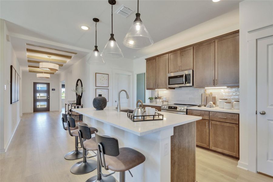 Model home photos of similar floorplans, not pictures of actual home.