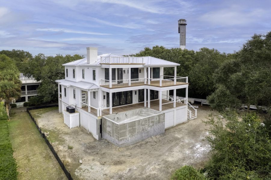 Exterior details and patio area of a home in , Sullivan's Island (Image 3). Exterior details and patio area of a home in , Sullivan's Island (Image 3).