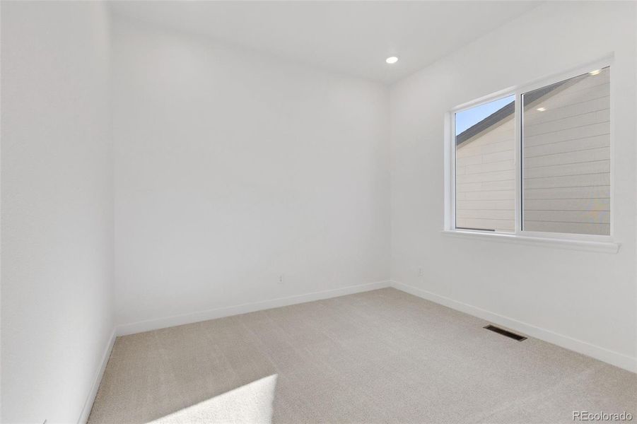 Spacious, unfurnished interior of a new home in Highlands Preserve, Mead (Image 22).