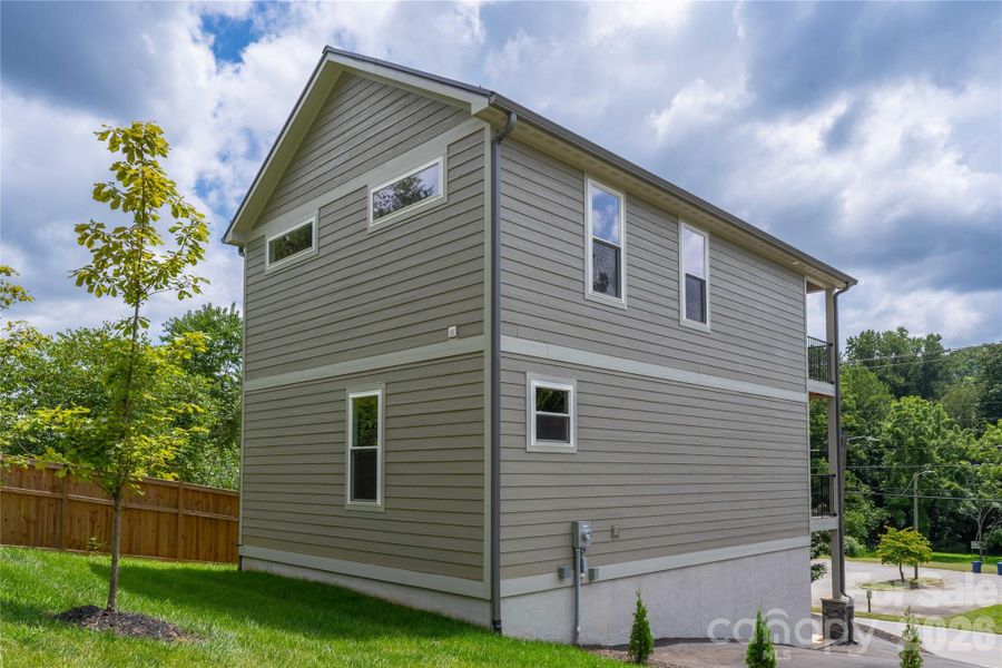 Exterior details and patio area of a home in , Asheville (Image 25).