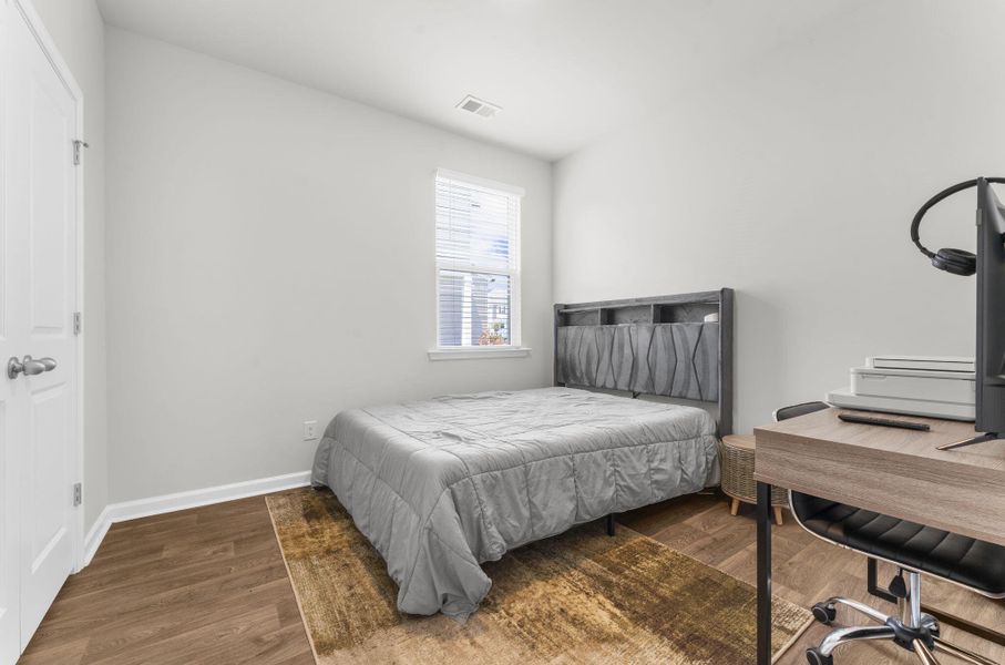 Furnished interior view inside a new home in Pine Hills at Cane Bay, Summerville (Image 31).