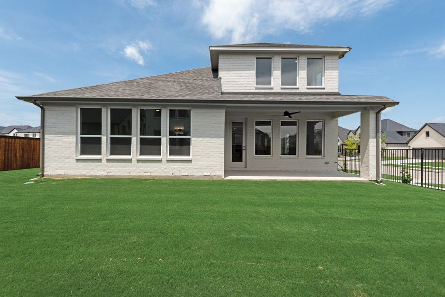 Exterior details and patio area of a home in Estates at Rockhill, Oak Point (Image 23).