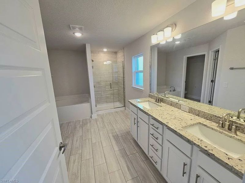 Furnished interior view inside a new home in Greenbriar, Lehigh Acres (Image 5).