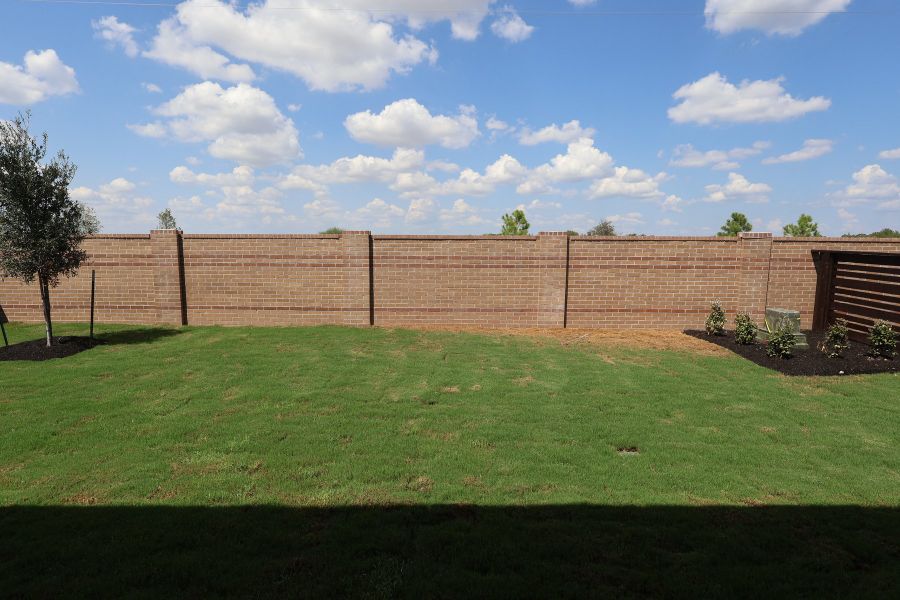 Exterior details and patio area of a home in Bridgeland Central: Emerald Heights - Enclave Collection, Cypress (Image 3).