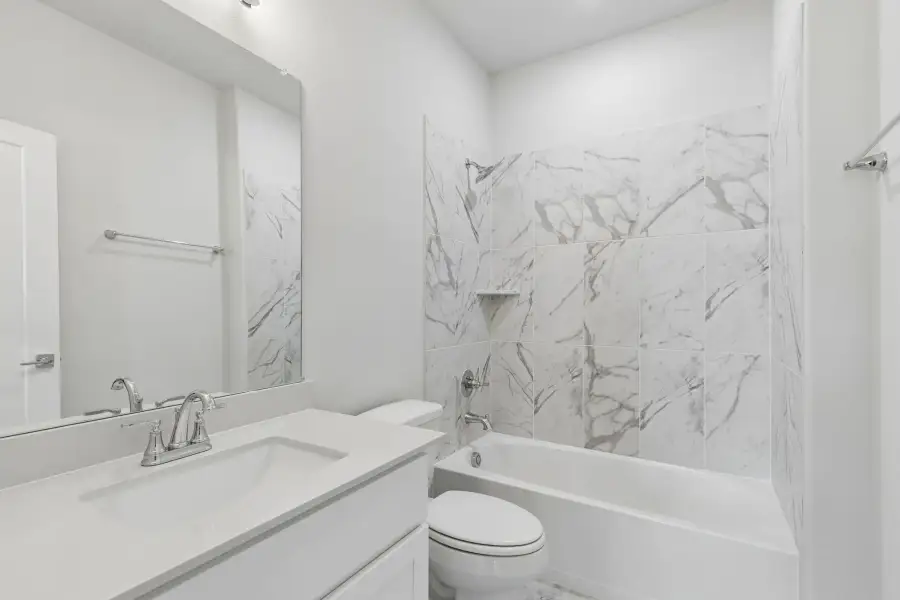 Bathroom in the Winters home plan by Trophy Signature Homes – REPRESENTATIVE PHOTO