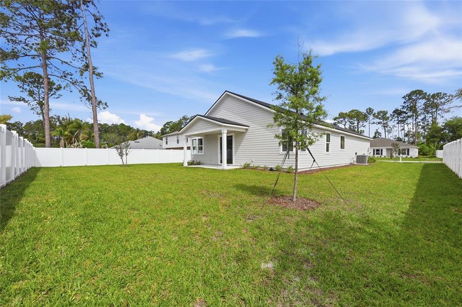 Exterior details and patio area of a home in Palm Coast Homes, Palm Coast (Image 32).