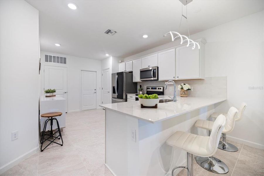 Furnished interior view inside a new home in , Sarasota (Image 30).