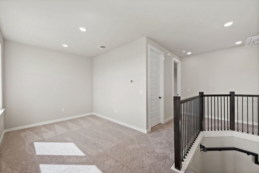 Spacious, unfurnished interior of a new home in Terrace Collection At Turner's Crossing, Buda (Image 39).