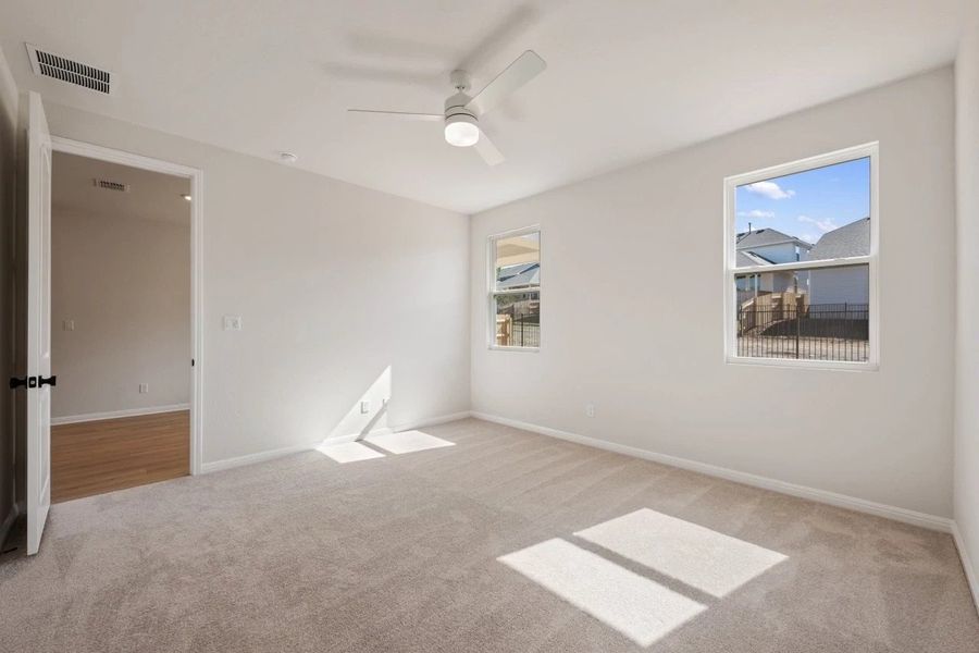Spacious, unfurnished interior of a new home in Cannon Ranch, Dripping Springs (Image 33).