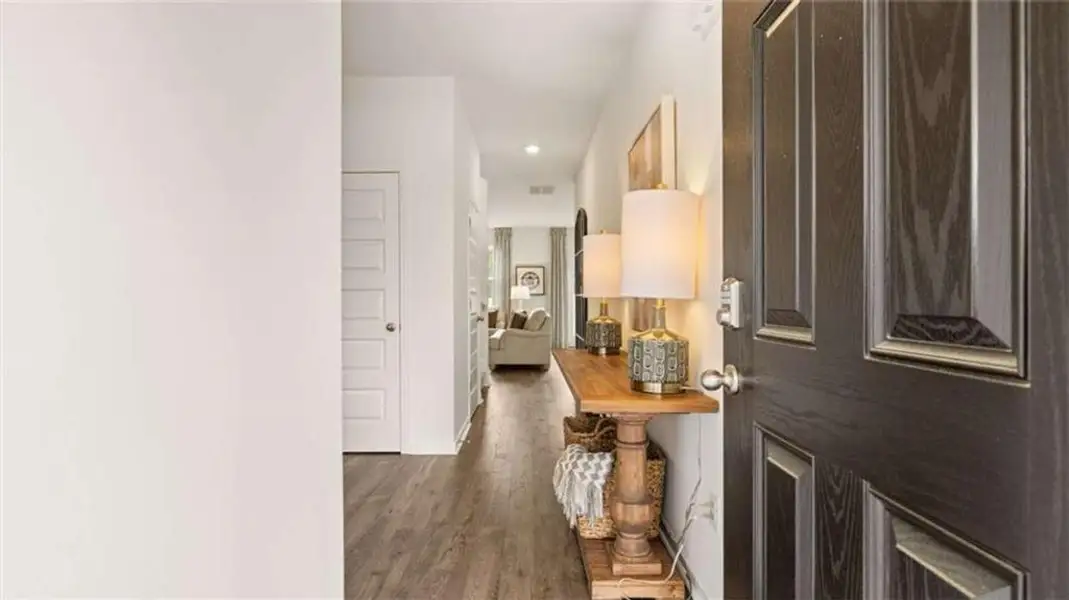 Furnished interior view inside a new home in Oakchase at Hampton, Hampton (Image 6).