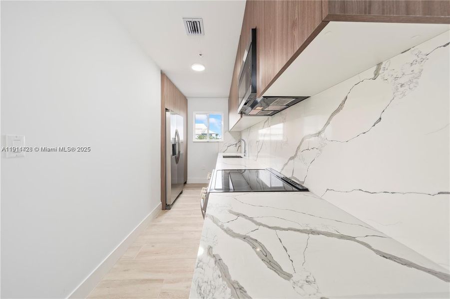 Furnished interior view inside a new home in , Miami (Image 9).