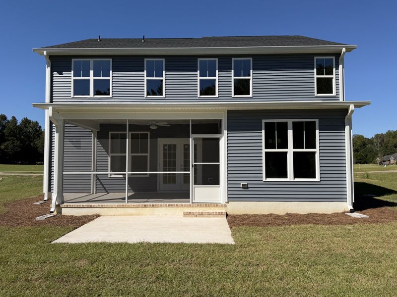 Exterior details and patio area of a home in Waterfall Estates, Whiteville (Image 25).