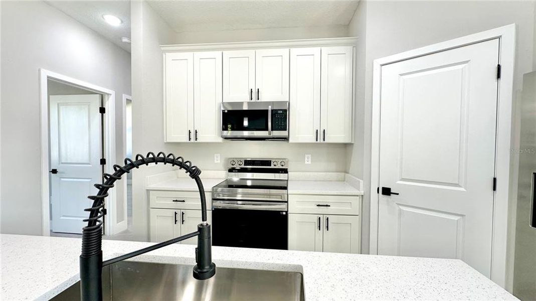 Furnished interior view inside a new home in , Poinciana (Image 16).