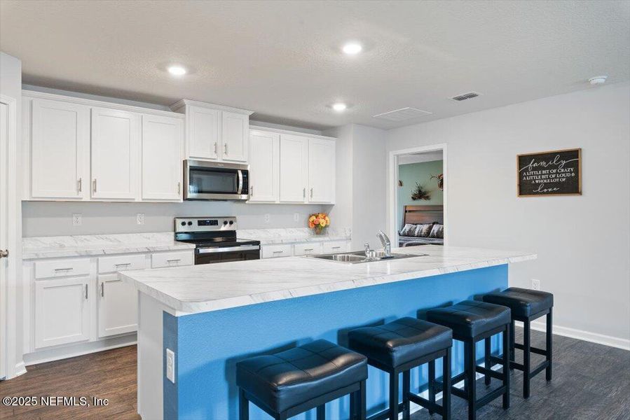 Furnished interior view inside a new home in River Glen Express, Yulee (Image 12).