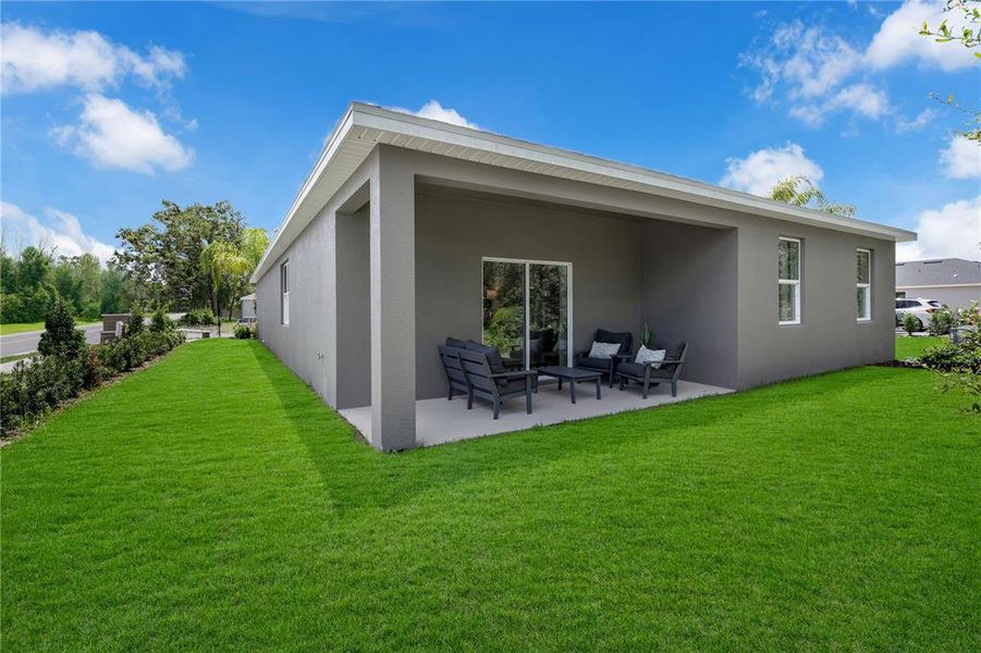 Exterior details and patio area of a home in Green Leaf, West Melbourne (Image 3).
