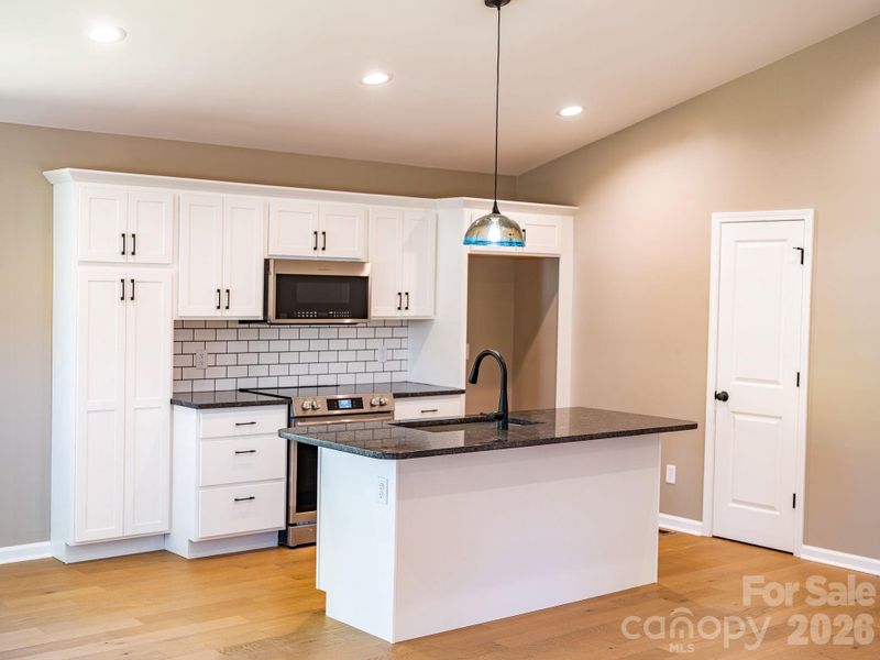 Furnished interior view inside a new home in , Waynesville (Image 4).