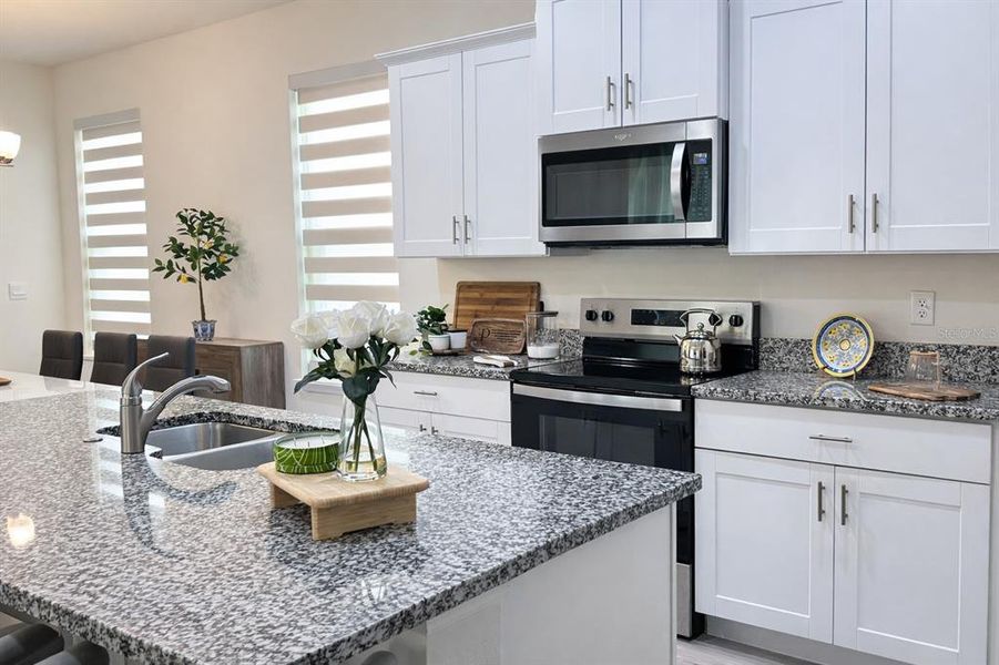 Furnished interior view inside a new home in Waterleigh, Winter Garden (Image 11).