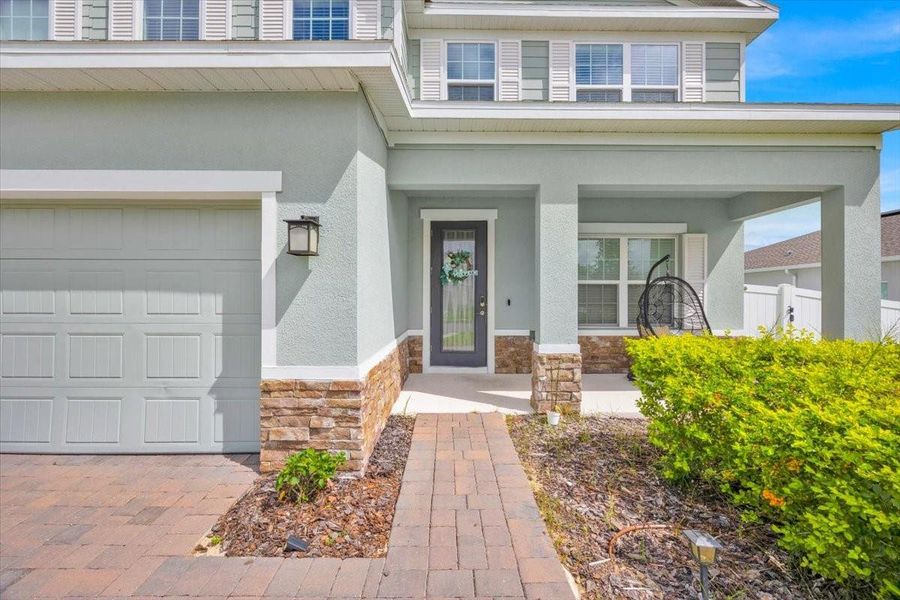 Front exterior of a new home in , Apopka, FL, highlighting curb appeal (Image 23).