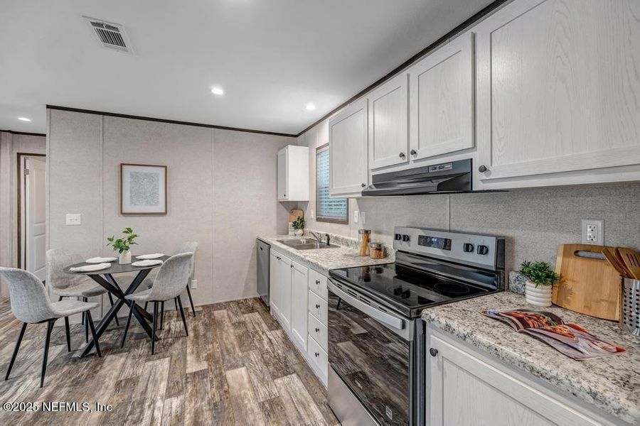 Furnished interior view inside a new home in , Jacksonville (Image 26). Furnished interior view inside a new home in , Jacksonville (Image 26).